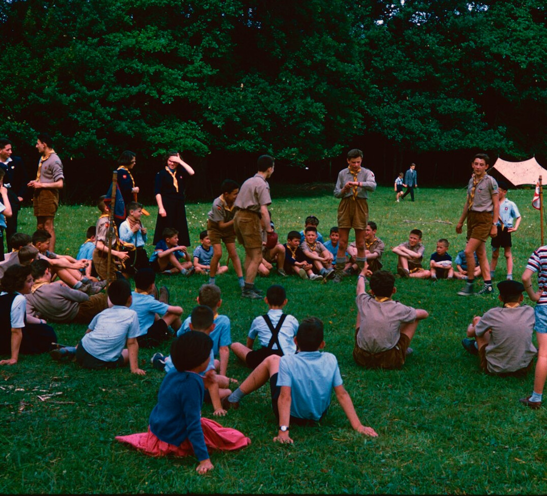 Professionals sitting in a circle during a leadership workshop