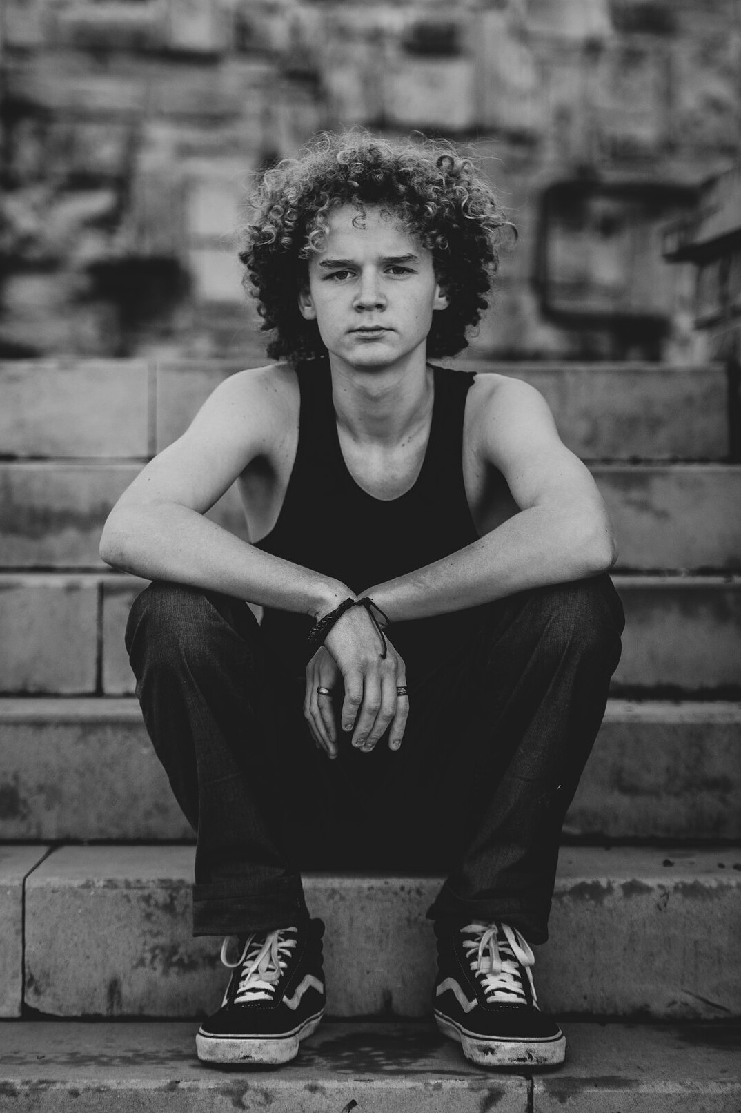 Portrait of a young man with curly hair